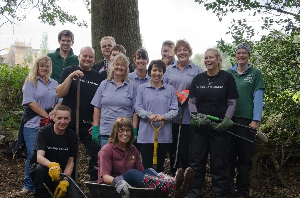 The Southern Co-operative volunteering with HIWWT at Havant Crematorium grounds